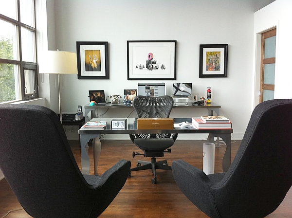 Home coaching office with two chairs facing a desk.